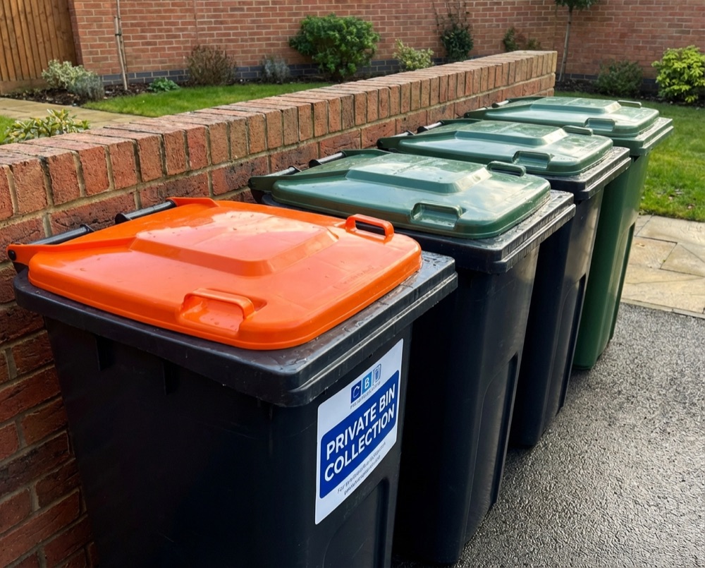 Recycling and general waste bins on a Littlehampton street